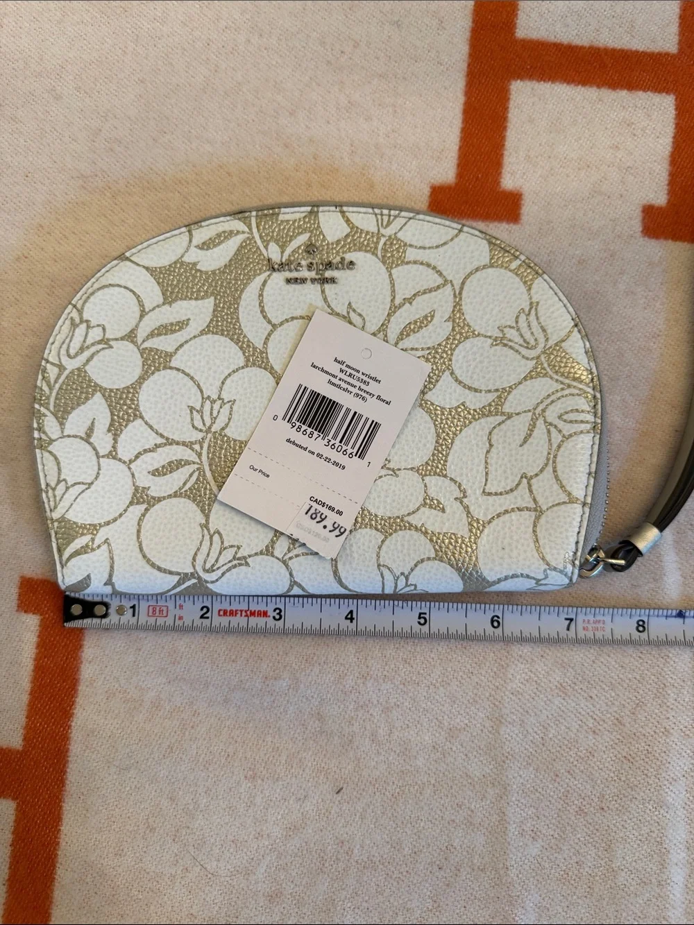 kate spade white and gold floral half moon wristlet pouch New w Tag